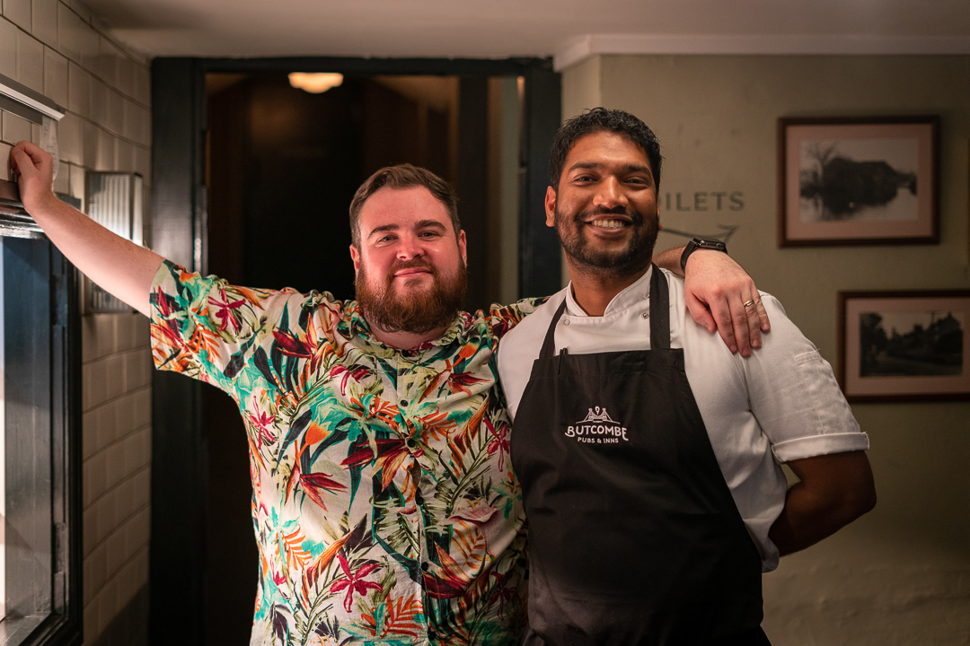 a happy butcombe chef and another happy man