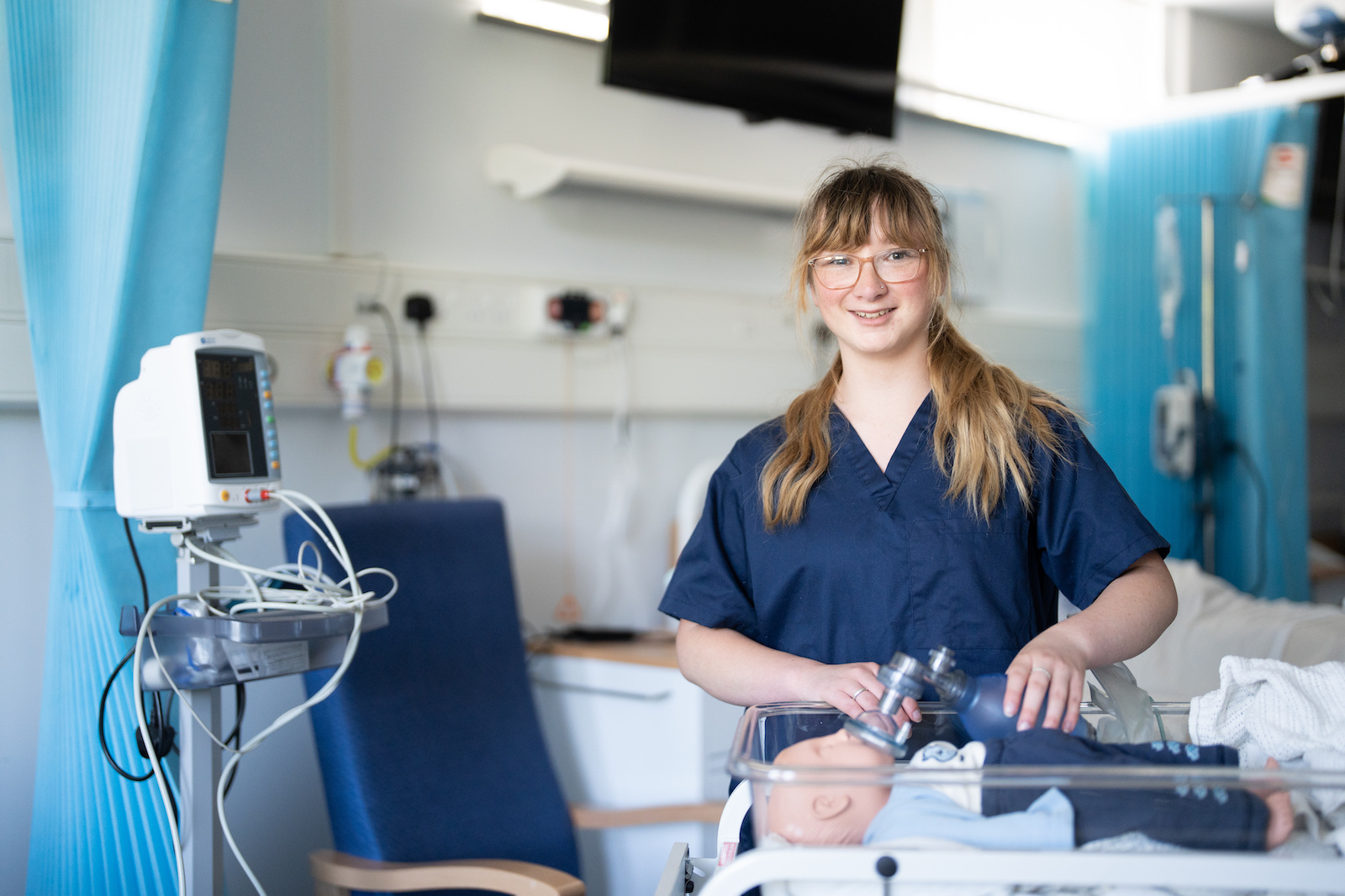 female student smiling studying health and social care in weston-super-mare at weston college