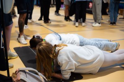 Two learners competing in a planking competition 