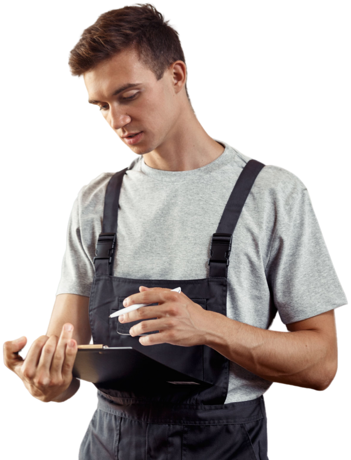 young male mechanical engineer inspecting something off camera