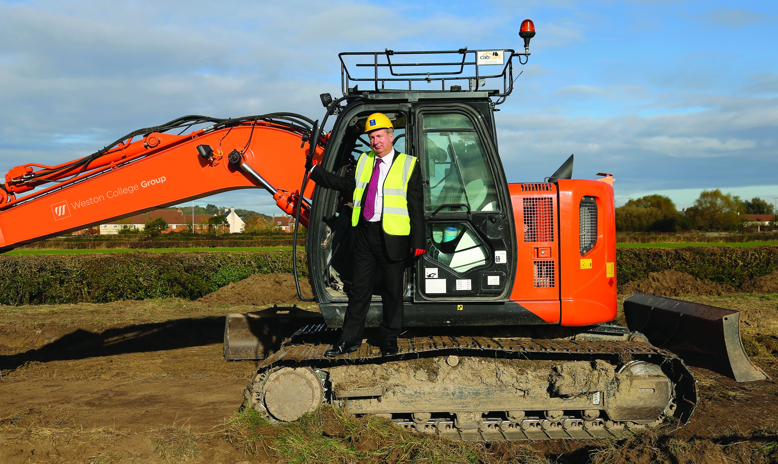 Dr Paul on a digger