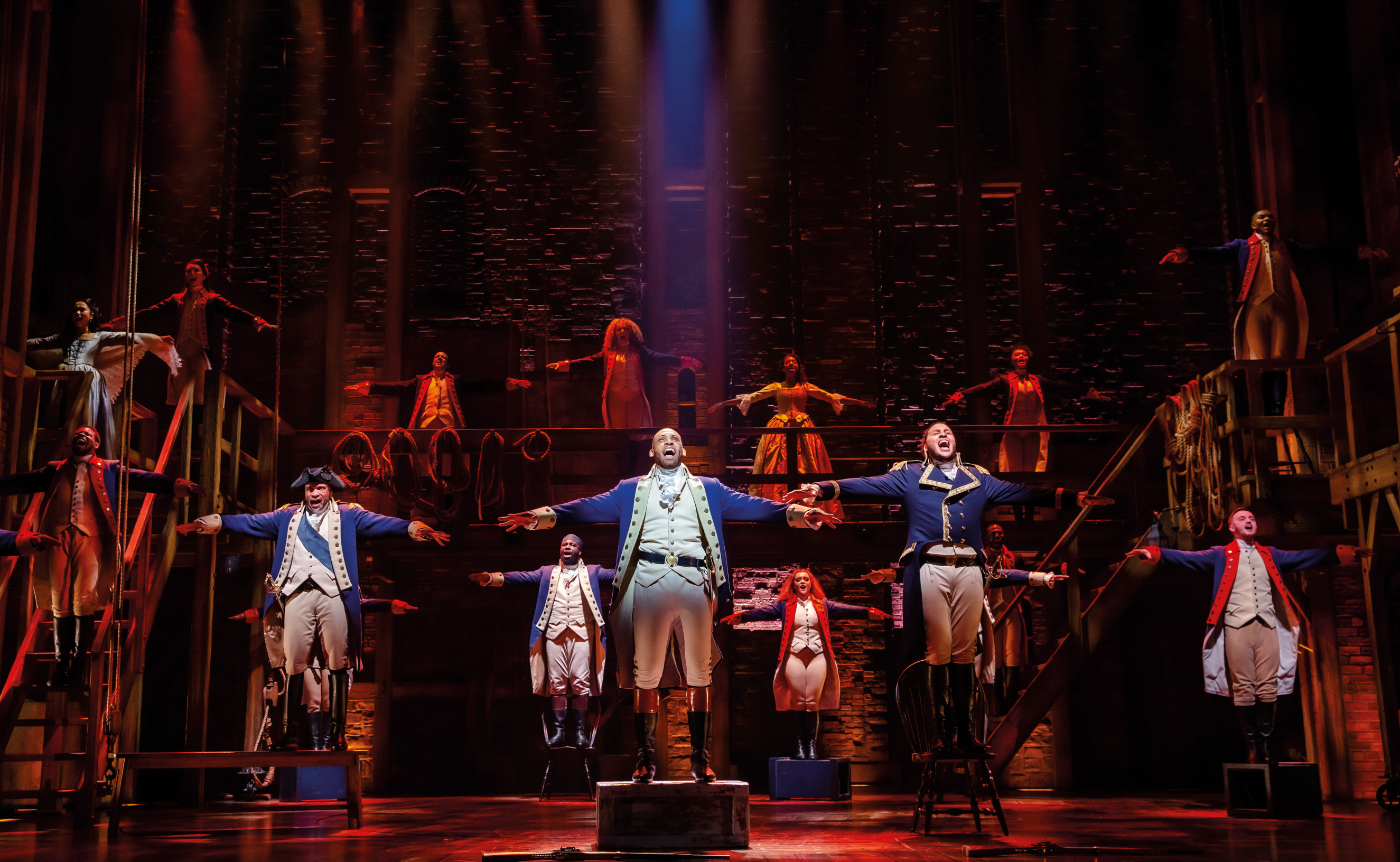 Shaq Taylor on stage as Hamilton in the musical 