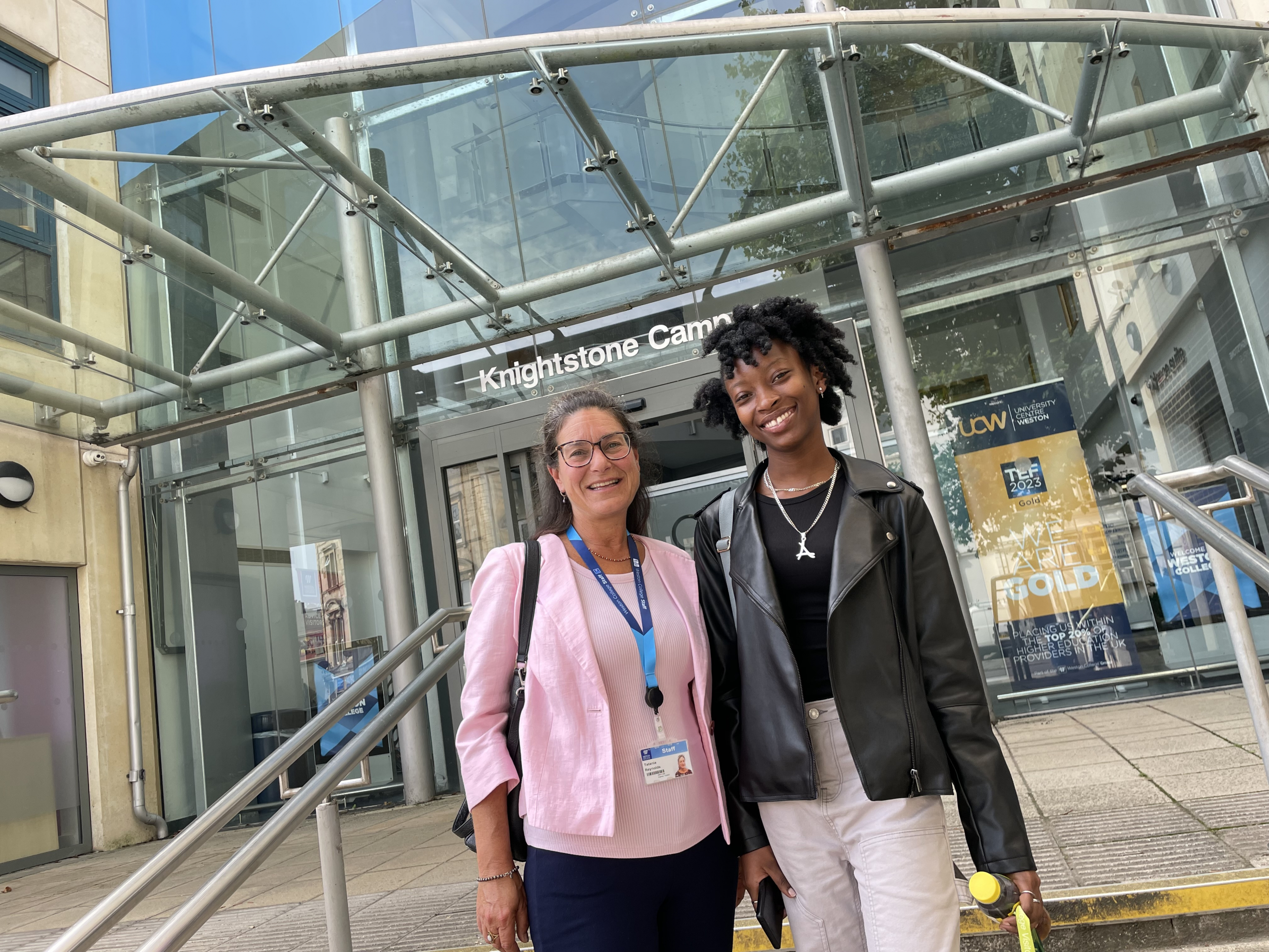  Ashana and her lecturer accepting GCSE English result