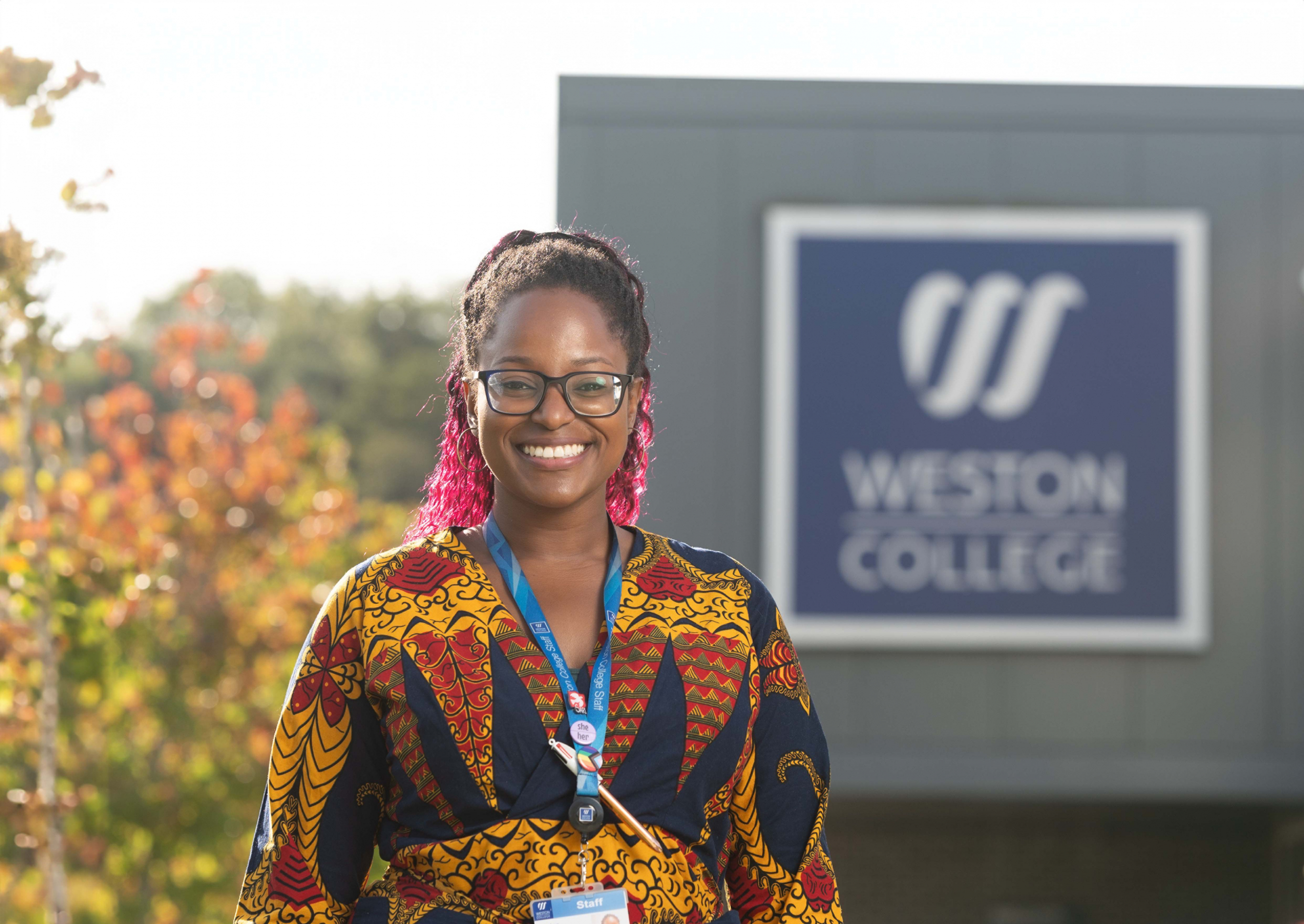 Louise Hill-Davis in front of weston college campus