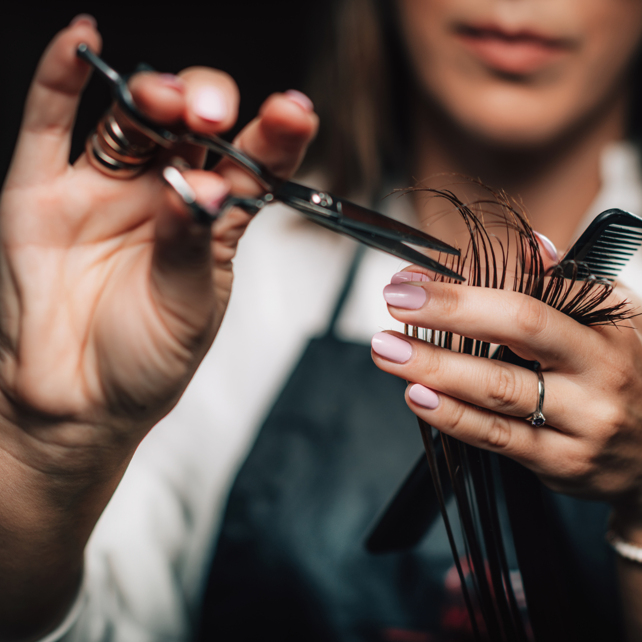 Woman cutting hair