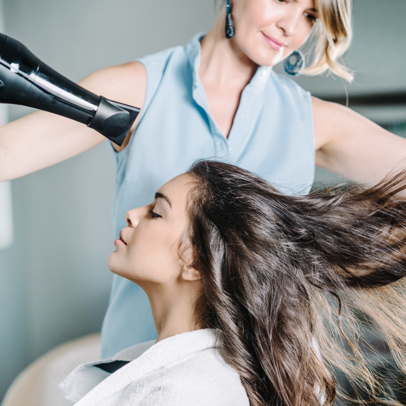 Woman having her hair dried