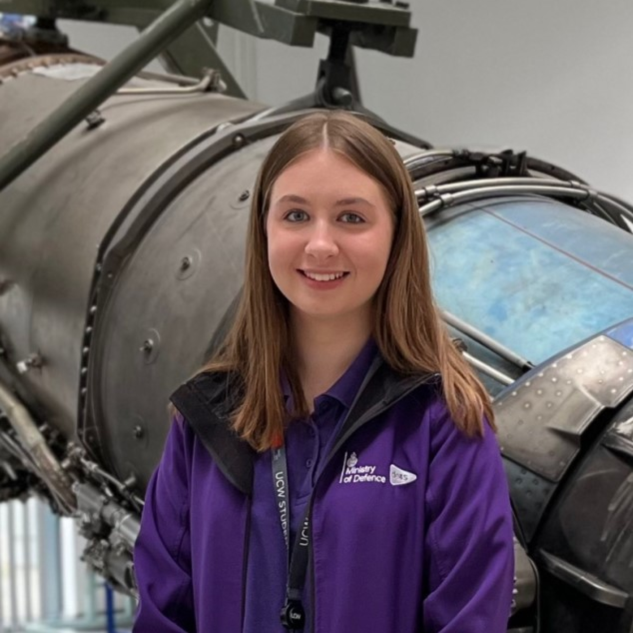 Georgia, MoD Apprentice, standing in front of jet