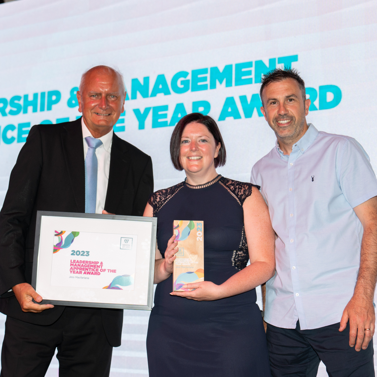 Jess - Leadership and Management Apprentice of the year collecting her award 