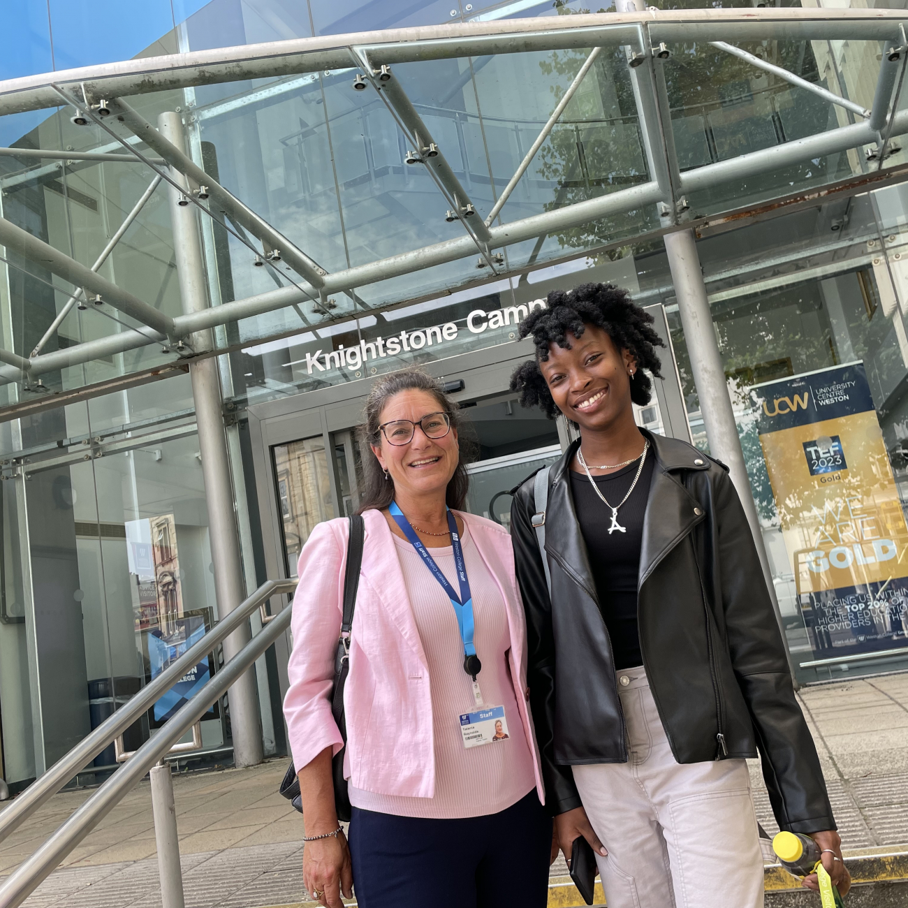  Ashana and her lecturer accepting GCSE English result