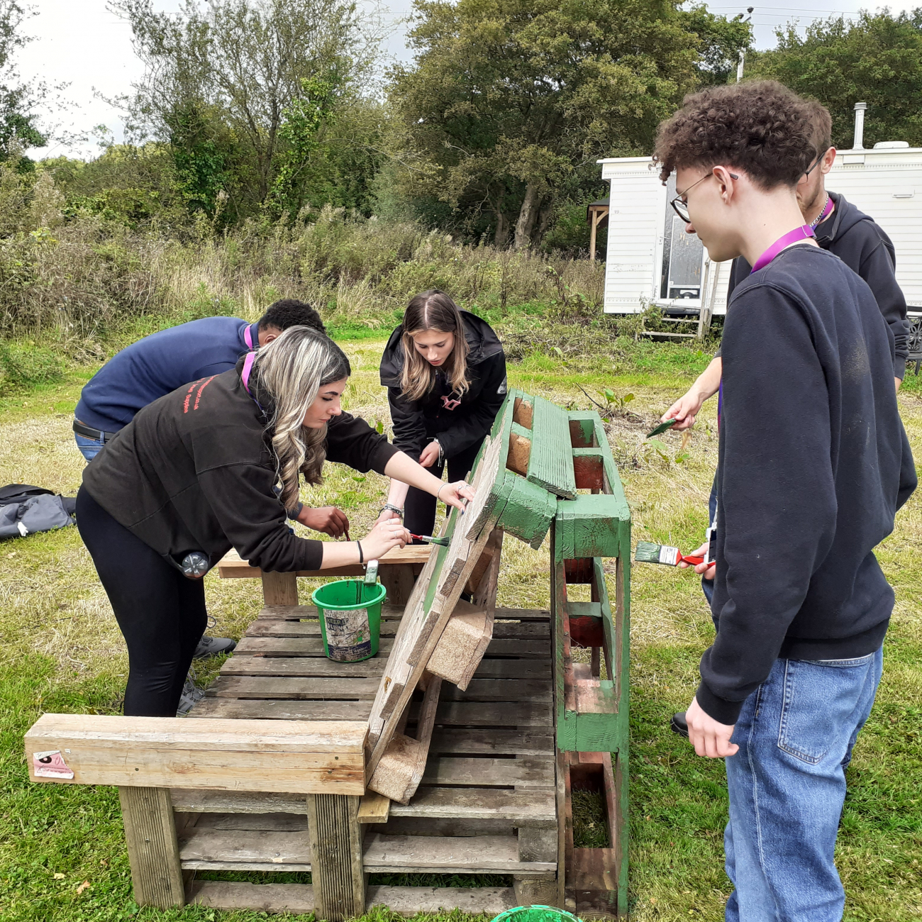 Construction T Level learners built a seat from pallets at Uncle Paul's Chilli Farm