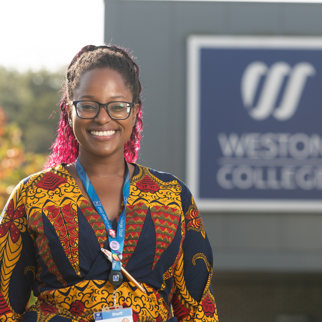 Louise Hill-Davis in front of weston college campus