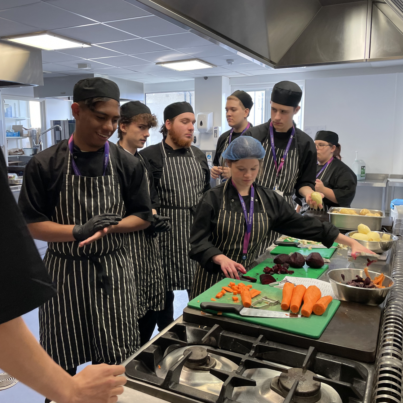 Hospitality and Catering learners prepping vegetables