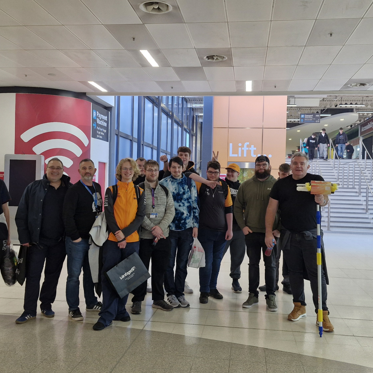 Learners posing in the foyer of the NEC