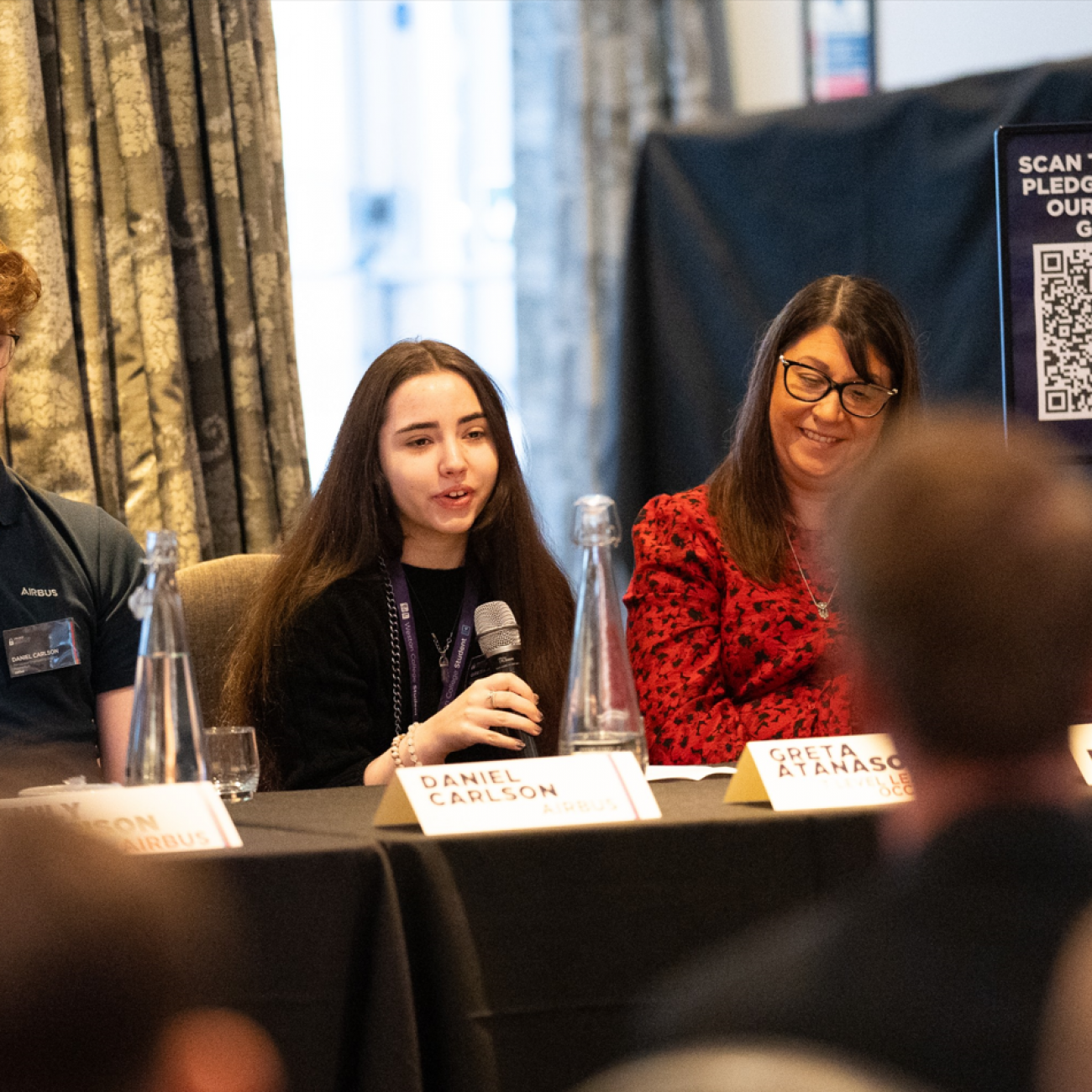 Greta on a panel talking about her T Level during an Employer conference