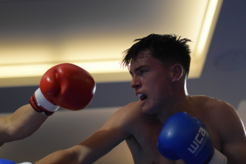 Action shot of a punch taken by the learners during a boxing match