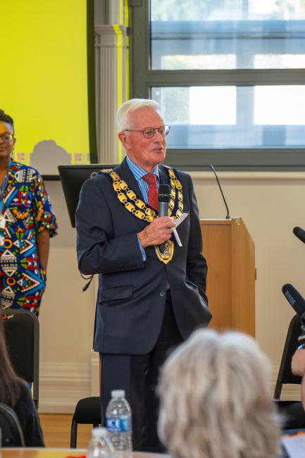 the mayor talking at the black history month event