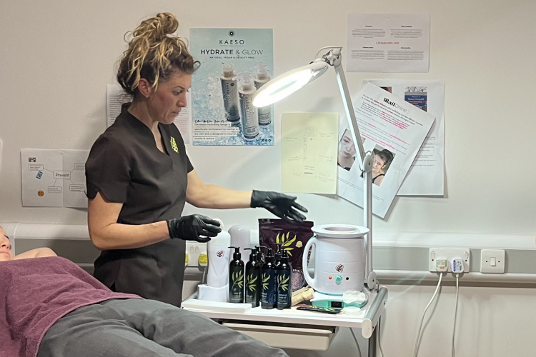 Claire from Outback Organics giving the students an underarm wax demonstration