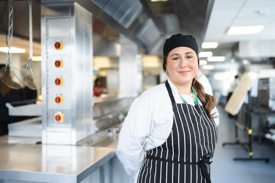 picture of female catering student in kitchen 